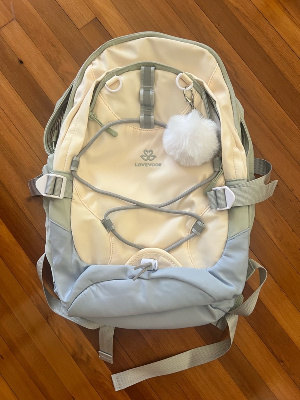 LOVEVOOK Cream, Light Sage, Baby blue viral Backpack with Pom Pom. Holds laptop